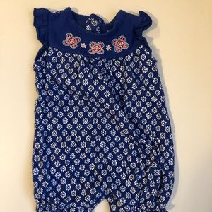 Baby girl’s blue onesie